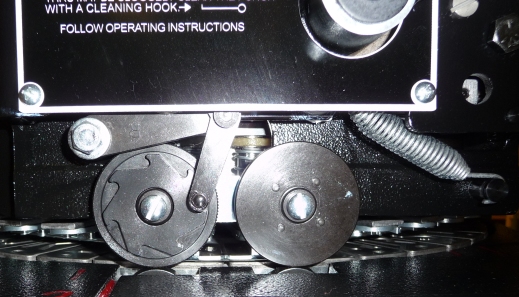 Material feed wheels area of Marsh stencil cutter